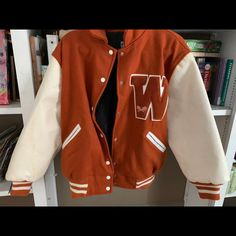 This Was Framed And Never Worn. The Arms Are Real Leather And The Fabric Is Real Wool. The Jacket Buttons Nicely And Is Insulated. White Hooded Varsity Jacket For Fall, White Varsity Jacket For College In Fall, White Long Sleeve Varsity Jacket For Fall, White Varsity Jacket With Pockets For Fall, White Long Sleeve Varsity Jacket For Winter, Casual White Varsity Jacket For Winter, White Varsity Jacket With Pockets For Winter, Casual White Varsity Jacket For Fall, Retro White Outerwear With Pockets