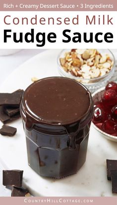 chocolate fudge sauce on a plate with cherries and almonds in the background