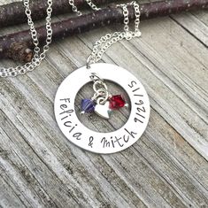 "This necklace makes the perfect gift for a bride to be or for an anniversary! 1\" aluminum washer comes hand stamped with the happy couple's names and special date with 2 genuine Swarovski crystal birthstone charms and a silver heart charm. You may also choose a different short phrase if you prefer, just please message me first to be sure that I can fit it on there. My items are hand stamped by me, making them a unique gift. Each letter is stamped individually and may not line up exactly adding Personalized Jewelry For Valentine's Day Wedding, Personalized Jewelry For Wedding On Valentine's Day, Stamped Jewelry For Valentine's Day Wedding, Personalized Round Pendant Jewelry For Wedding Gift, Personalized Round Jewelry For Wedding, Personalized Round Pendant For Wedding Gift, Stamped Sterling Silver Necklace For Wedding, Mother's Day Wedding Gift Jewelry: Round Pendant, Nickel-free Jewelry For Wedding On Valentine's Day