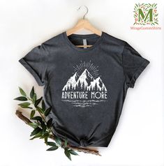 Adventure TShirt, Adventure Tee, Camping Shirt, Mountain TShirt, Hiker TShirts, Camping Gift, Vacation Group Shirts, Nature Lover Gift Shirt --- How To Order ----- 1-) Please, check and review all the photos. 2-) Choose your t-shirt size and color. *Different styles of shirts may have different shades of same color choice due to different manufacturer brands. *For this reason, we recommend you to match shirts from the same styles if you want precisely matching colors (ex. Unisex, V-necks, Toddle Graphic Tee With Text Print For Adventure, Outdoor Short Sleeve Slogan Tops, Cotton Slogan Tops For Outdoor Activities, Black Cotton T-shirt For Adventure, Outdoor Slogan Crew Neck Top, Outdoor Slogan Tops With Crew Neck, Short Sleeve Tops With Text Print For Adventure, Adventure T-shirt With Letter Print And Short Sleeves, Camping Text Print Crew Neck T-shirt