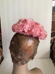 "Vintage 1950's 1960's Petite and Sweet Pink floral hat. The label is *Miss Sally Victor* New York. To keep hat on your head, you would need to use a hatpin (Not Included). *MORE INFORMATION BELOW* CONDITION: No issues noted. MEASURES: Inside circumference-16\" Front to back-6\" Left to right-6\" *WE APOLOGIZE~BUT WE NO LONGER SHIP TO GERMANY, ITALY OR SPAIN. IF ORDERS COME IN FROM GERMANY, ITALY OR SPAIN, WE WILL HAVE TO CANCEL THEM AND REFUND YOUR MONEY. SORRY FOR THIS INCONVENIENCE*" Vintage Mini Hat Headband For Parties, Vintage Mini Hat Headband For Vintage Events, Vintage Headband For Kentucky Derby, Vintage Evening Fascinator Headband, Vintage Mini Hats With Structured Crown For Evening, Vintage Kentucky Derby Fascinator With Structured Crown, Vintage Kentucky Derby Mini Hat Headband, Vintage Handmade Costume Hats And Headpieces, Vintage Fascinator For Kentucky Derby With Structured Crown