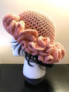 This ruffle hat is "one size fits most". The size is a standard size. If you want one larger or smaller, we can accommodate that request. This style hat has become pretty well-known! It is a basic bucket hat, with 3 rows of ruffles. If you like less or more ruffles, just let me know. I can also accommodate that request Adjustable Pink Hat With Ruffles, Pink Spring Hat With Ruffles, Spring Pink Hat With Ruffles, Pink Ruffled Hat For Spring, Beach Hat With Ruffles And Curved Brim, Beach Hats With Ruffles And Curved Brim, Brimmed Beach Hat With Ruffles, Spring Hats With Ruffles One Size, Summer Brimmed Hat With Ruffles