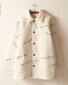 White Cotton Quilted Jacket For Fall, White Cotton Quilted Jacket For Winter, Cotton Quilted Jacket With Button Closure, Embroidered Cotton Button-up Outerwear, Cotton Outerwear With Geometric Embroidery For Fall, Long Sleeve Cotton Quilted Jacket With Buttons, Quilted Cotton Jacket With Buttons, New York View, Victorian Quilts