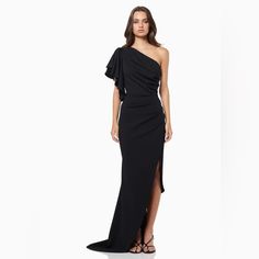 Elliatt Convivial One Shoulder Gown - Black Crafted From Heavy Crepe Fabric, Elliatt's Convivial Gown Offers Sleek Elegance. A Single Frilled Sleeve, Side Split, And Short Train Add Subtle Details For An Unforgettable Look. An Extra Flattering Drape Is Featured Across The Waistline Complete With An Understated One Shouldered Design. Nwt No Care Tag Pre-draped Maxi Length Formal Gown, Pre-draped Maxi Gown For Formal Occasions, Pre-draped Maxi Dress With Sweep Train For Evening, Pre-draped Maxi Length Cocktail Gown, Pre-draped Maxi Length Cocktail Evening Dress, Pre-draped Floor-length Evening Gown, Evening Floor-length Pre-draped Gown, Black Pre-draped Cocktail Gown, Black Pre-draped Evening Dress For Wedding