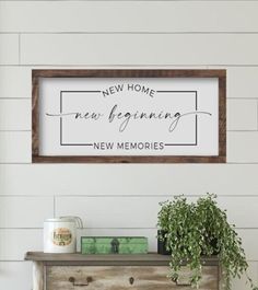 a sign that says new home, new beginnings and new memories on the wall above a dresser