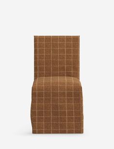 a brown and white checkered chair against a white background with the seat facing forward