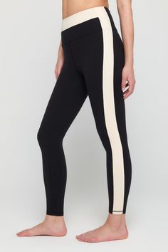 Meet your wear-everywhere leggings. Pair them with a cozy sweater, oversized tee, or with the cutest matching Aurora workout bra. Anyway you spin it, these sculpting, moisture-wicking wonders are the ready for the occasion. Squat-proof and lifting ready Ultra-flattering, sculpted compression Comfort-driven flatlock seams Breathable and moisture-wicking Contrasting colorblock design | Leighton Colorblock Legging in Black Compression Color Block Leggings For Workout, Sporty Compression Activewear With Color Block, Sporty Color Block Leggings For Training, High Stretch Color Block Leggings For Athleisure, Sporty Color Block Leggings For Yoga, Sporty Color Block Leggings For Gym, Sporty Black Leggings For Loungewear, Fitted Activewear With Contrast Stripes For Workout, Fitted Gym Activewear With Contrast Panels