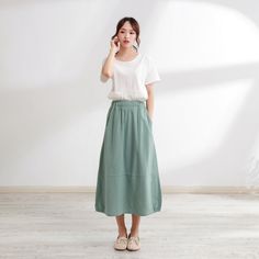 Size Chart :  It is the garment's measurements, Not body measurements . Size XS:  Flexible Waist: 65cm-80cm（25.6"-29.5"）, Length: 75 cm （29.5"） Size S: Flexible Waist: 70cm-85cm（27.5"-33.5"）, Length: 75 cm （29.5"） Size M: Flexible Waist: 75cm-90cm（29.5"-35.5"）, Length: 75 cm （29.5"） Size L: Flexible Waist: 80cm-95cm（31.5"-37.5"）, Length: 75 cm （29.5"） Size XL: Flexible Waist: 90cm-105cm（35.5"-41.5"）, Length: 75 cm （29.5"） Size XXL: Flexible Waist: 100cm-115cm（39.5"-45.5"）, Length: 75 cm （29.5"） Size 3XL: Flexible Waist: 110cm-125cm（43.5"-49.5"）, Length: 75 cm （29.5"） Size 4XL: Flexible Waist: 120cm-135cm（47.5"-53.5"）, Length: 75 cm （29.5"） Size 5XL: Flexible Waist: 130cm-145cm（51.5"-57.5"）,  Length: 75 cm （29.5"） Size 6XL: Flexible Waist: 140cm-150cm（56.5"-63.5"）,  Length: 75 cm （29.5"） 🌸 Casual Solid Color Relaxed Mini Skirt, Casual Solid Color Midi Pencil Skirt, Spring Midi Skirt With Pockets, Cotton Tiered Skirt With Solid Color, Cotton Tiered Skirt In Solid Color, Long Skirt With Pockets For Spring, Casual Solid Color Knee-length Pencil Skirt, Casual Pencil Skirt With Pockets For Spring, Casual Spring Pencil Skirt With Pockets