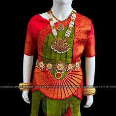 Design by Classical Dance Jewelry® ❥ Traditional Bharatanatyam costume wore during regular dance programs or arrangetram performance. ❥ Material : Art Silk ❥ Type : Traditional pant costume ❥ Easy to wear ❥ layer front fan ❥❥❥❥ 30 inch PANT LENGTH Dress Measurements ( all the measurements approximately 1 -2 margin buffer) Age: 7 - 9 yrs ❥ PANT MEASUREMENTS: ☛ Pant Length: 29-30 inch ☛ Pant Waist: 27-28 inch ☛ Pant Hip: 28-29 ❥ BLOUSE MEASUREMENTS : ☛ Blouse length: 10-11 inch ☛ Blouse Shoulder : Traditional Green Choli With Tilla Detailing, Traditional Green Choli With Tilla Embroidery, Traditional Green Tilla Choli, Green Ceremonial Sets For Festivals, Ceremonial Green Cutdana Sets, Green Ceremonial Sets With Pallu, Ceremonial Green Sets With Pallu, Ceremonial Green Saree Set, Green Tilla Sets For Traditional Ceremonies