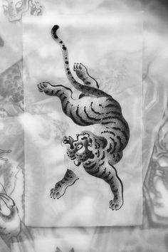 a drawing of a tiger leaping in the air