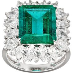 Ignite your passions with the exquisite Love And Commitment Opera Ring from Ruchi New York. A modern classic, this ring is a showstopping centerpiece featuring a mesmerizing Colombian emerald surrounded by a halo of mixed shape diamonds. With 5.58 carats of Colombian emerald and 2.65 carats of dazzling diamonds, this ring embodies elegance and sophistication.Part of Ruchi's esteemed High Jewelry collection, the Love & Commitment Opera Ring symbolizes the pinnacle of romance and commitment. Crafted to honor and celebrate every love affair, this collection offers exceptional diamond and gemstone jewelry designed to reflect the uniqueness of each romance and milestone. Whether it's scintillating diamond engagement rings, wedding bands, or colorful gemstone anniversary bands and bracelets, eac Elegant Formal Emerald Ring With Halo Design, Elegant Emerald Ring With Halo Design For Formal Events, Elegant Emerald Ring With Halo Design For Formal Occasions, Luxury Formal Emerald Ring With Halo Design, Luxury Emerald-cut Emerald Ring With Halo Design, Luxury Emerald Cut Emerald Ring With Halo Design, Dazzling Formal Emerald Ring With Halo Design, Luxury Emerald Ring With Halo Design, Luxury Emerald Ring With 17 Jewels For Promise