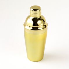 A gold cocktail shaker sitting on a white background. Gold Cocktail, Custom Gift Boxes, Cocktail Shaker, Bar Cart, Corporate Gifts, Customized Gifts, Bar, Gold