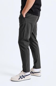 These versatile slim-leg trousers from the label's Coach's series are made from stretch fabric for comfort in the office or on the back nine. 31" inseam; 13" leg opening; 10 3/4" front rise Zip fly with snap closure Front zip pockets; back welt pockets Diamond crotch gusset for added mobility and stretch 52% polyester, 48% recycled polyester Machine wash, line dry Imported Elastane Work Pants With Pockets For Business Casual, Stretch Work Pants With Pockets For Business Casual, Business Casual Stretch Dress Pants With Side Pockets, Casual Elastane Dress Pants For Business, Business Stretch Chinos Straight Fit, Business Casual Pants With 4-way Stretch And Side Pockets, Business Casual Pants With Side Pockets And 4-way Stretch, Business Casual 4-way Stretch Pants With Side Pockets, Stretch Business Casual Work Trousers