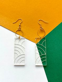 Calling all abstract lovers! Show your style with these acrylic laser-cut earrings! These earrings are the perfect accessories for your stylish outfit. -------------------------------------------------- * S I Z E S    &    M A T E R I A L S * - These earrings are roughly 8cm in length and 2cm in width. - This product is made of laser-cut acrylic plastic. It can come in a range of colours. Please refer to the colour options menu. - These earrings are available in gold shepherds hook fixtures. - E Modern White Pierced Earrings, Modern White Geometric Earrings, White Laser-cut Jewelry For Gifts, Modern White Rectangular Earrings, White Laser Cut Earrings As A Gift, White Laser Cut Earrings For Gift, Modern Laser Cut Jewelry For Gifts, Acrylic Earrings Laser Cut, Laser Cut Jewelry Acrylic