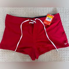 Red Nike Swim Shorts With Tie, Detail, And Guard On The Back Size Medium Nwt See Pictures For Details. Red Stretch Swim Trunks With Built-in Shorts, Red Fitted Swim Trunks For Summer, Fitted Red Swim Trunks For Summer, Red Summer Swim Trunks, Casual Fitted Red Swim Trunks, Red Fitted Casual Swim Trunks, Fitted Red Casual Swim Trunks, Summer Swimming Shorts In Red, Summer Shorts For Swimming In Red