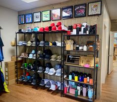 a room filled with lots of hats on shelves