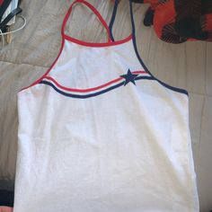 Great For 4th Of July And Going Out! Lightweight And Razor Back Casual American Flag Print Tank Top For Spring, Spring Casual Tank Top With American Flag Print, White Sleeveless Tank Top For 4th Of July, Casual White Tank Top With Flag Print, White Sleeveless Top With Flag Print, Casual 4th Of July Flag Print Tank Top, Sporty Flag Print Summer Tops, Sporty Summer Tops With Flag Print, Trendy Red Top With Flag Print