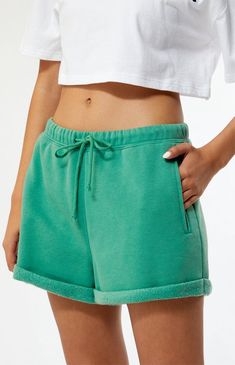 Upgrade your loungewear with the PacSun Pacific Sunwear Dotted Rolled Sweat Shorts. These shorts feature a drawstring waistband for a customizable fit and side hand pockets for convenience. With a roll cuff hem and Pacific Sunwear embroidery on the back, they blend comfort with style for a laid-back look that's perfect for any casual occasion.Solid color sweat shorts11.125" rise2.25" inseamSoft fleece liningDrawstring waistbandSide hand pocketsRoll cuff hemPacSun embroideryRelaxed fit60% cotton, 40% polyesterMachine washableModel is wearing a size smallModel measurements: 5’6” height, 30” bust, 25.5” waist, 36.5” hip PacSun Womens Pacific Sunwear Dotted Rolled Sweat Shorts - Green size Small Shorts Sweat Set, College Class, Pacific Sunwear, Drip Drop, Sweat Set, Drawstring Top, Sweat Shorts, Green Shorts, Cute Shorts