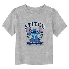 Ohana means family, and family means no tee gets left behind! Find the perfect style for your little one with this officially licensed Toddlers' Disney Lilo & Stitch Weird, but Cute Alien Graphic T-shirt! This fun design features Stitch surrounded by a laurel wreath and the words: "Stitch weird, but cute," across the front. Celebrate a certain alien, otherwise known as Experiment 626 with new fabulous apparel from the incredible movie! Alien Graphic, Experiment 626, Cute Alien, Ohana Means Family, Sleeve Packaging, Disney Lilo, Graphic Tee Design, Laurel Wreath, Left Behind