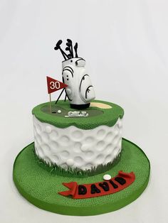 a golf themed birthday cake with the number 30 on it