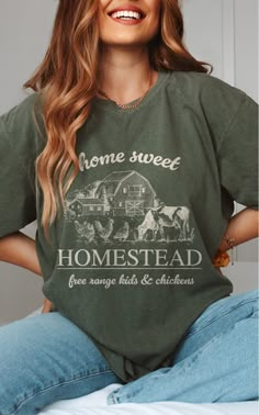 ✺ HOME SWEET HOMESTEAD GRAPHIC SHIRT  ✺ Get this trendy Comfort Colors graphic tee. * Q U I C K F A C T S * This design is a unique, one-of-a-kind awesome illustration that has been created in house. ✺ 100% ring-spun cotton ✺ Medium fabric ✺ Relaxed fit Please note that colours may appear different on different digital screens and may not be a true representation of the actual colours. This is a Unisex T-Shirt which you can use as an Oversize T-Shirt Dress, please check the dimensions to make su Hometown Shirt Ideas, Homestead Shirt Ideas, Homestead Aesthetic Outfit, Homestead Outfits, Homestead Shirt, Cricut Shirt Ideas, Sourdough Shirt, Homeschool Shirts, Vintage Graphic Tees