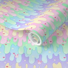 a colorful wallpaper with pastel colors and bunnies on it's sides