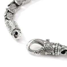 In 18th century Italy, no musician was as renowned as Niccolo Paganini. Created in carved sterling silver, Konstantino celebrates the virtuoso and creative passion of Paganini through this exceptional link bracelet. 8" long with lobster clasp to fit most wrists. Includes branded Konstantino gift packaging. Formal Engraved Link Bracelets, Luxury Sterling Silver Bracelet With Oval Link, Classic Sterling Silver Bracelet Engraved For Formal Occasions, Classic Engraved Sterling Silver Bracelet For Formal Occasions, Classic Formal Sterling Silver Engraved Bracelet, Timeless Engraved Sterling Silver Bracelet, Luxury Engraved Oval Link Bracelet, Luxury Chain Bracelet With Intricate Design, Traditional Engraved Sterling Silver Bracelet For Formal Occasions