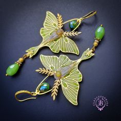 Luna Moth opal earrings with shimmers wings, made from high-quality colourful polymer clay, colours do not wash out and do not fade in the sun, decorated by Ethiopian opal cabochons, Swarovski crystals and glass beads. Single copy,100% Handmade OOAK earrings. All items are shipped from my home within 1-3 business days after payment confirmation. Please, contact me with any questions. I make some custom orders. If you would like some items to be custom made or created for you in a special way, fe Whimsical Green Czech Glass Earrings, Unique Green Butterfly Earrings, Elegant Green Resin Earrings, Whimsical Green Hand Painted Earrings, Green Butterfly Nature-inspired Jewelry, Nature-inspired Green Butterfly Jewelry, Bohemian Green Enamel Earrings, Bohemian Green Butterfly Jewelry, Green Bohemian Butterfly Jewelry