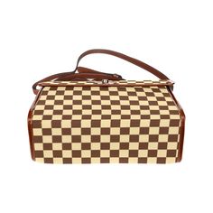 • Elevate your style with our Brown Checker Handbag, a chic accessory featuring a retro-inspired checker pattern.• Designed in a Mod 60s purse style, this Retro Handbag adds a vintage flair to any outfit, perfect for those who appreciate timeless fashion.• Crafted from high-grade tarpaulin, this Checker Bag offers both durability and style, making it a practical yet fashionable choice.•The brown and beige white checker pattern print gives this Brown Checker Satchel Handbag a modern retro feel, adding a touch of sophistication to your look.Designed in California by Trendy Hip Buys. Handmade to order from overseas.Material: high-grade tarpaulinDimensions: 10.8"(L) x 4.13"(W) x 7.87"(H),Two internal pockets for small items, one zipper pocket; Removable and adjustable shoulder straps. Retro Everyday Rectangular Case Bag, Retro Rectangular Case Bag For Everyday Use, Retro Rectangular Box Bag For Everyday Use, Retro Travel Crossbody Box Bag, Retro Crossbody Box Bag For Travel, Retro Square Satchel With Detachable Strap, Retro Satchel Box Bag For Travel, Retro Square Shoulder Bag For Travel, Retro Rectangular Travel Case Bag