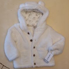 Brand New Never Worn With Tags 18 Month, Super Soft Cozy Jacket Cute White Hooded Jacket With Long Sleeves, Cute White Long Sleeve Hooded Jacket, Cute White Outerwear With Fleece Lining, Cute White Hooded Jacket For Fall, Cute White Outerwear For Fall, Winter Long Sleeve Outerwear For Playtime, Cute Warm White Outerwear, Cute Cream Winter Outerwear, Casual Winter Outerwear For Playtime