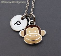 "❖ Monkey Face Charm: Silver Plated and enamel painted. Approx: 1/2\" ❖ Hand Stamped Initial Charm - Antique Silver Pewter 3/8\" (9mm) ❖ Add a birthstone or Freshwater pearl for $3.50 https://www.etsy.com/listing/110444872 ❖ Additional Hand Stamped Initial Charms $4.50 each: https://www.etsy.com/listing/107021419 ❖ Go back to Short and Bald Jewelry http://www.etsy.com/shop/ShortandBaldJewelry ❖ Your purchase will arrive attractively packaged and ready to give. ❖ FREE shipping within USA for orde Monkey Face, Face Necklace, Silver Monogram, Necklace Initial, Initial Charm, Initial Necklace, Antique Gold, Hand Stamped, Washer Necklace