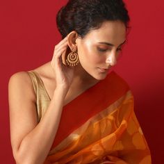 About the Jewelry Looking for earrings that give you a traditional look with a pinch of the modern Indian chic? Kalpa is what you need. Crafted beautifully with various patterns and texture these chaandbalis makes you look elegant in the best way possible. Styling Tip A semi-ethnic attire or a tunic will go perfectly with these earrings. Details & Specifications: Materials used: Brass Metal with Antique Plating Weight - Earrings 21 gm Length - Earrings 6 cm Make it custom Want to make it a custo Buy Earrings Online, Traditional Look, Chandbali Earrings, Earrings Indian, Buy Earrings, Latest Jewellery, Custom Earrings, End Of Season Sale, Online Earrings