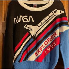 You’re Go For Launch In This Adorable 80s/90s Themed Retro Space Shuttle Sweater! Fit Is Cropped, So It Runs About Two Sizes Small. New Without Tags. Nasa Clothes Outfit, Nasa Tshirt Outfits, Space-themed Cotton Crew Neck Top, Nasa Sweater, Space-themed Graphic Crew Neck Tops, Nasa Shirt, Nasa Space Shuttle, Space Nasa, Space Shuttle