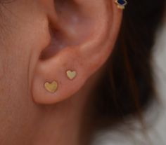 14K SOLID GOLD single heart stud earring - small or large - SINGLE! Small heart: 3.6mm = 0.14 inch OR Large heart: 4.6 mm = 0.18 inch Perfect for a variety of piercing locations: nostril / lobe / 3rd, 2nd hole earring / tragus / conch / helix / cartilage ♦ Please choose size: Small 4.6 mm = 0.18 inch OR Large : 4.6 mm = 0.18 inch ➤ Features: ♦ Material: Yellow 14k SOLID GOLD rose/ yellow ♦ Wire thickness: 20 gauge - 8 mm Straight shape end post with silicone back (10mm approx.). 14k gold back ma Minimalist 14k Gold Heart Earrings, Cute Gold Heart Charm Earrings, Cute Gold Double Heart Earrings, Cute Double Heart Gold Earrings, Dainty Yellow Gold Huggie Heart Earrings, Minimalist Gold Hypoallergenic Heart Earrings, Dainty Yellow Gold Heart Earrings For Everyday Wear, Tiny Dainty Yellow Gold Heart Earrings, Everyday 14k Gold Hypoallergenic Heart Earrings