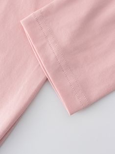 Our Henley Drawstring Tee-Pink is the perfect combination of style and comfort. The drawstring style with the buttons makes this tee a must have in your closet! The pink color effortlessly makes this tee stand out even more! Pink Solid Color T-shirt For Spring, Trendy Pink T-shirt Solid Color, Trendy Pink Solid Color T-shirt, Pink Short Sleeve Solid Color Top, Pink Solid Color Crew Neck Top, Pink Crew Neck Top, Solid Color T-shirt For Loungewear, Cotton Solid Color T-shirt For Loungewear, Pink Long Sleeve T-shirt For Loungewear