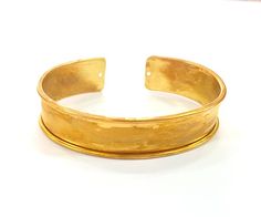 Nickel Free and Lead Free Material : Raw brass Color: Raw brass Size : 15mm Blank Size : 11,7mm Quantity : 1 pc. To see other all Raw Brass Bracelet Blanks please click below https://www.etsy.com/shop/AZsupplies/search?search_query=bracelet+blank+raw+brass&order=date_desc&view_type=list&ref=shop_search To see other all Raw Brass Ring Blanks please click below https://www.etsy.com/shop/AZsupplies/search?search_query=nice+raw+ring+blank&order=date_desc&view_type=list&ref=sh Adjustable Wide Band Gold Bracelet, Adjustable Gold Band Cuff Bracelet, Gold Cuff Bracelet With Thick Band As Gift, Gold Cuff Bracelet With Thick Band For Gift, Wide Band Yellow Gold Bracelets As Gift, Wide Band Yellow Gold Bracelets For Gift, Gold Bracelets With Thick Band For Gifts, Adjustable Yellow Gold Round Cuff Bracelet, Gold Thick Band Bracelet For Gift