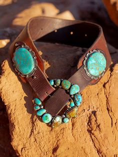 "On the Range" turquoise ranger buckles, what a statement! These buckle are inspired, artful creations and look amazing with any belt combination, especially the "Wild West" turquoise conchos. They are a fine combination of several American mines, including Royston, Piolet, Kingman and Sonoran gold. "On the Range" our horseshoe ranger shape is about 4 by 4 inches of the best turquoise money can buy.. Size and quality of stones can vary so pricing these is very challenging, so please contact us f Southwestern Turquoise Concho Belt Buckles, Adjustable Turquoise Western Belt Buckles, Western Turquoise Belt With Concho, Turquoise Western Belt With Concho, Vintage Turquoise Belt With Concho, Bohemian Concho Belt Buckles For Western-themed Events, Turquoise Bohemian Belt With Concho, Turquoise Bohemian Belt Buckle With Antique Detail, Southwestern Antique Belt Buckles For Ranch