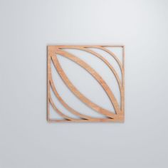 an abstract wooden design on a white wall