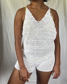 Dazzle on the beach with our customizable crochet cotton romper cover-up! This romper is stylish and comfortable and made from soft, breathable cotton. With a variety of sizes and colors to choose from, you can make this romper truly your own. Show off your unique style and enjoy the warm weather in this must-have beach essential! Color options are in the last photo slide! In the text box, please list the following measurements (shown in the second to last photo) to ensure the best fit: Bust, Hips, Waist and Shoulder to Hip. This crochet romper is handmade from cotton yarn. It is perfect for spring and summer and is super lightweight. Please don't hesitate to message me if you have any questions or want this in a different size or color! I will happily do custom orders at no additional cos White Crochet V-neck Dress For Beach, Casual V-neck Crochet Top For Beach, White Beachy Crochet Dress With V-neck, White V-neck Crochet Beach Dress, Summer Cotton Crochet Lace Top, Sleeveless Cotton Crochet Top For Beach Season, Short Tops For Beach Vacation, Casual Open Knit Swimwear For Beach, Casual Open Knit Swimwear For Vacation