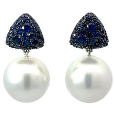 18 Karat White Gold drop earrings featuring two South Sea Pearls measuring 12-13 MM and 76 blue Sapphires weighing 1.33 Carats. Pearls earrings can be changed to Tahitian, Pink, Gold or South Sea DM for more videos and pictures on my ear. Search Harbor Diamonds White Gold Drop Earrings, Rosa Gold, Pearls Earrings, South Sea Pearls, Sea Pearls, Gold Drop Earrings, Pearl Drop Earrings, Pearl Drop, Tahiti