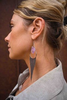 Our most popular crystal fringe statement earrings now come with Amethyst crystals. These unique tassel earrings look stunning when the light dances off of them! They are the perfect bridal or bridesmaids earrings or would make a great gift for yourself or a girlfriend. Amethyst is a stone of intuition, connecting you to your inner wisdom, empowering you to trust yourself! Amethyst crystals *color of purple amethyst is lighter purple and ranges in lightness Silver fringe earrings Weight: .22 oz Crystal Drop Tassel Earrings For Wedding, Crystal Tassel Drop Earrings For Wedding, Crystal Tassel Earrings For Wedding, Wedding Crystal Tassel Earrings, Wedding Jewelry With Tassels, Silver Tassel Wedding Earrings, Elegant Lavender Crystal Earrings For Party, Wedding Jewelry With Tassels, Dangle Shape, Lavender Amethyst Earrings For Party