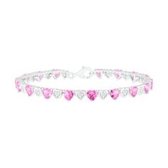 Enjoy the vibrant color of this heart fashion bracelet. Created in sterling silver, this design features 5.0mm heart-shaped lab-created bright pink sapphires alternating with shimmering lab-created white sapphire clusters within polished heart-shaped frames. Buffed to a brilliant luster, this 7.25-inch link bracelet secures with a lobster claw clasp. White Gold Heart Cut Bracelet, Valentine's Day Heart Cut Diamond Bracelet, Valentine's Day White Gold Heart Cut Bracelet, White Gold Heart Cut Bracelet For Valentine's Day, Elegant Pink Sterling Silver Bracelets, White Gold Heart Cut Tennis Bracelet, Valentine's Day Fine Jewelry Heart Bracelet, Elegant Pink Bracelet For Valentine's Day, Fine Jewelry Heart Cut Bracelet For Valentine's Day