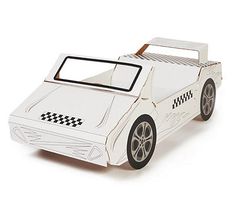 a paper model of a race car on a white background