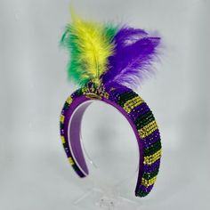 Unleash your inner carnival queen as this sparkly headpiece has you crowned as the Queen of Mardi Gras! Laissez les bon temps rouler *Locally hand made in New Orleans. Headpieces usually ship within 3-5 business days. Please be aware that due to the unique and handmade nature of each product, color, shapes, and sizes may vary slightly from the photo and descriptions. Adjustable Headpiece For Mardi Gras Party, Adjustable Crown Costume Accessories For Party, Adjustable Mini Hat For Mardi Gras Costume Party, Adjustable Headband Costume Hats For Carnival, Adjustable Tall Crown Headband, Carnival Costume Hats And Headpieces With Matching Headband, Adjustable Crown Costume Hat For Party, Adjustable Party Headpiece With Rhinestones, Adjustable Headpiece For Party And Carnival