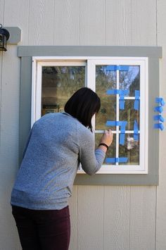 How to install DIY window grilles (also known as window grids, window mullions, or window mutins.) This simple tutorial will show you how to add major style to your windows for under $10! Use the same method for interior shower doors or exterior french doors. Add extra style to your living room, dining room, kitchen, or even the entire house! #diyhomeimprovement #diy Fake Window Mullions, Diy Window Mullions Exterior, Faux Window Mullions, Diy Grids For Windows, Faux French Windows, Diy Window Upgrade, How To Add Grids To Windows, Diy Black Window Grids, Diy Faux Window Pane