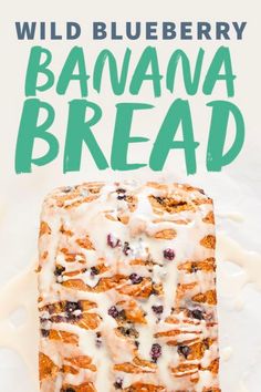 a blueberry banana bread with icing on top and the words wild blueberry banana bread