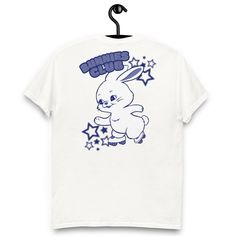 New Jeans Bunnies Tokki T-Shirt Great gift for BUNNIES or a concert shirt! 🐰  * 100% cotton  * Taped neck and shoulders  * Double seam at sleeves and bottom hem * Unisex sizing Cute Graphic Design T-shirt For Streetwear, Cute Shirt With Funny Print For Streetwear, White Kpop T-shirt For Streetwear, Kpop Short Sleeve Shirt With Graphic Print, Cotton Kpop T-shirt With Short Sleeves, Kpop Fan Merchandise White T-shirt, Kpop Style Shirt For Streetwear With Short Sleeves, Kpop Style Cotton Shirt With Short Sleeves, Kpop Style Short Sleeve Shirt For Streetwear