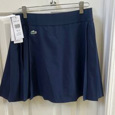 Navy Blue Tennis Skirt With Integrated Shorts Navy Blue Tennis Skirt, Blue Tennis Skirt, Athletic Skort, Lacoste Women, Pleated Tennis Skirt, Lacoste Sport, Tennis Skort, Golf Skirts, Golf Skort