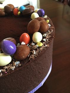 a chocolate cake topped with lots of candies