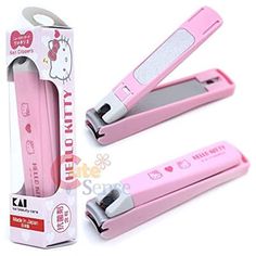 three pink hello kitty hair straighteners are in the box and ready to be used